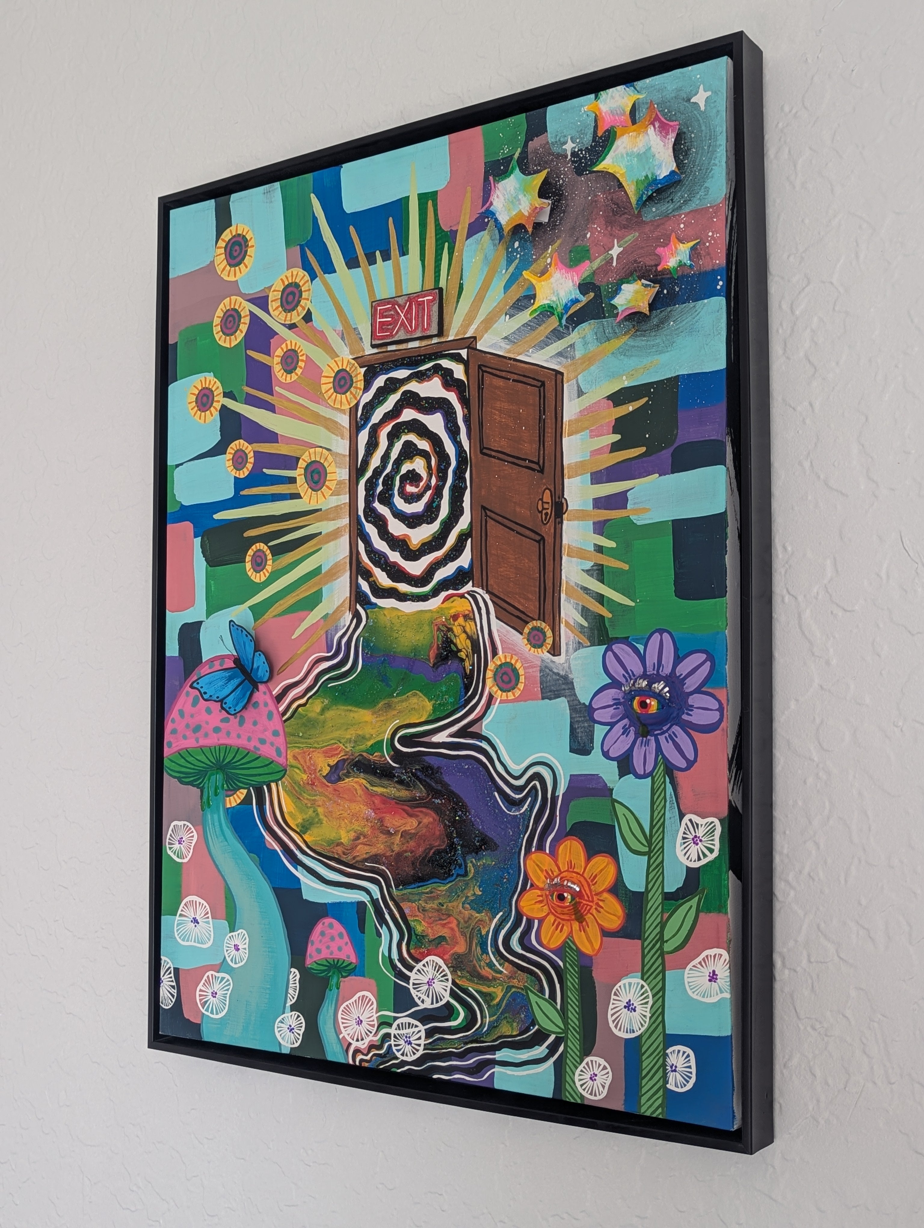Escaping Wonderland original artwork displayed on a wall
